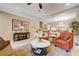 Comfortable living room showcasing a fireplace and an open-concept design at 9729 Hawk Crest St, Las Vegas, NV 89141