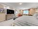 Large main bedroom with furniture and lots of natural light at 9729 Hawk Crest St, Las Vegas, NV 89141