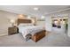 Bright main bedroom with carpeting and recessed lights at 9729 Hawk Crest St, Las Vegas, NV 89141