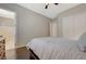 Bedroom showcasing hardwood floors, closet and ensuite bath at 334 Cougar Estates Ln, Las Vegas, NV 89123