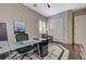 Home office with large windows and hardwood flooring at 334 Cougar Estates Ln, Las Vegas, NV 89123