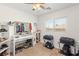 Bedroom featuring shelves, two pieces of luggage on stands, and a window at 10253 Martinsburg Ct, Las Vegas, NV 89183