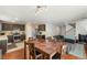Cozy living space with a dining area and an adjacent kitchen with modern appliances at 10253 Martinsburg Ct, Las Vegas, NV 89183