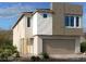 Modern two-story home featuring a neutral color palette and attached two-car garage at 10283 Water Knot Ave, Las Vegas, NV 89166