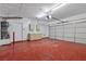 Spacious two-car garage with epoxy floor and storage solutions at 10613 Tiffanieville Ct, Las Vegas, NV 89129