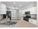 Well-lit kitchen boasts stainless appliances, countertop space and eating nook at 10613 Tiffanieville Ct, Las Vegas, NV 89129