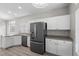 Bright kitchen with stainless steel appliances, white cabinets, and plenty of natural light at 10613 Tiffanieville Ct, Las Vegas, NV 89129