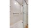Shower includes a grab bar, shampoo shelves, and glass door at 1101 Willow Tree Dr # D, Las Vegas, NV 89128