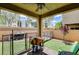 Cozy backyard features a covered patio, artificial turf, and a -proof safety fence at 1425 Overseer Ave, Henderson, NV 89074
