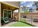 Backyard featuring a covered patio, artificial turf, safety fence, and a patio set at 1425 Overseer Ave, Henderson, NV 89074
