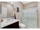 Clean bathroom showcasing a glass enclosed shower, vanity with sink, and neutral wall color at 1425 Overseer Ave, Henderson, NV 89074