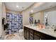Bright bathroom features a double sink vanity, and a playful Star Wars themed shower curtain at 1425 Overseer Ave, Henderson, NV 89074