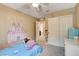 Bedroom with a castle mural, closet with sliding doors, and a ceiling fan at 1425 Overseer Ave, Henderson, NV 89074