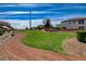 Well-maintained community green space with walking path, shrubbery, and a grassy lawn at 1425 Overseer Ave, Henderson, NV 89074