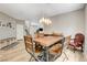 Bright dining area with wooden table set perfect for Gathering gatherings at 1425 Overseer Ave, Henderson, NV 89074
