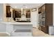 Modern kitchen featuring stainless steel appliances and a breakfast bar at 1425 Overseer Ave, Henderson, NV 89074