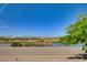 Scenic lake view with trees and landscaping, offering a serene environment near the property at 1425 Overseer Ave, Henderson, NV 89074