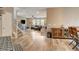 Bright open-concept living space with hardwood floors and comfortable seating area at 1425 Overseer Ave, Henderson, NV 89074