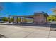 Outdoor picnic area with tables, benches, and a covered shelter for community gatherings on a sunny day at 1425 Overseer Ave, Henderson, NV 89074