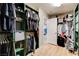 Organized walk-in closet featuring custom shelving, hanging rods, and ample storage space at 1425 Overseer Ave, Henderson, NV 89074