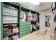 Organized walk-in closet featuring custom shelving, drawers, and ample storage space at 1425 Overseer Ave, Henderson, NV 89074