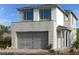 Beautiful two-story home with modern architectural details and an integrated two-car garage at 1547 Pacific Baza St, Las Vegas, NV 89138