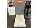 Display of matte black faucet with gray cabinets, white paint, and white quartz countertop at 1547 Pacific Baza St, Las Vegas, NV 89138