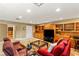 Finished basement with plush seating, built-in cabinets, and a warm, inviting atmosphere at 2001 Silver Ave, Las Vegas, NV 89102
