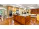 This kitchen has a large island with cooktop, stainless appliances, and beautiful countertops at 2001 Silver Ave, Las Vegas, NV 89102