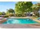 Lush backyard showcasing a private pool with a slide at 2001 Silver Ave, Las Vegas, NV 89102