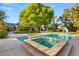 Lush backyard showcasing a private pool with a hot tub and a slide at 2001 Silver Ave, Las Vegas, NV 89102