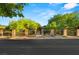 Elegant brick gate and fence with mature landscaping, offering privacy and curb appeal at 2001 Silver Ave, Las Vegas, NV 89102