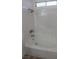 Bright and modern bathtub with shower and updated fixtures at 2711 Sesame Dr, Las Vegas, NV 89142