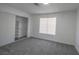 Bright bedroom with closet, window, and new carpet at 2711 Sesame Dr, Las Vegas, NV 89142