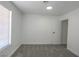 This bedroom features neutral carpet and white walls at 2711 Sesame Dr, Las Vegas, NV 89142