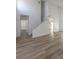 This living room boasts soaring ceilings and stylish wood floors at 2711 Sesame Dr, Las Vegas, NV 89142