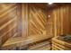 Private sauna room featuring custom wood paneling and built-in bench seating at 2925 Coast Line Ct, Las Vegas, NV 89117