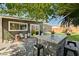 Cozy backyard featuring a custom bar and patio with a seating area, perfect for outdoor entertaining at 3013 Roseville Way, Las Vegas, NV 89102