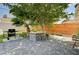 Cozy backyard featuring an outdoor kitchen area with a stone countertop, and patio at 3013 Roseville Way, Las Vegas, NV 89102