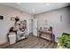Bright bedroom with hardwood floors, recessed lighting, and shelving for organization and storage at 3013 Roseville Way, Las Vegas, NV 89102