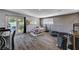 Bonus room with hardwood flooring with access to backyard, providing a comfortable and versatile space at 3013 Roseville Way, Las Vegas, NV 89102