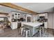 A bright kitchen with an island, modern appliances, and a breakfast bar for casual dining at 3013 Roseville Way, Las Vegas, NV 89102