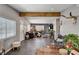 Spacious living room with hardwood floors, modern decor, and natural light at 3013 Roseville Way, Las Vegas, NV 89102
