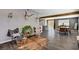 A spacious living room with a view of the kitchen and dining areas, great for entertaining at 3013 Roseville Way, Las Vegas, NV 89102