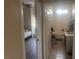 Bathroom featuring tile floors and shower-tub combo at 3051 S Rainbow Ave, Pahrump, NV 89048