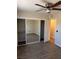 Bedroom with hardwood floors and mirrored closet at 3051 S Rainbow Ave, Pahrump, NV 89048