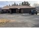 Charming single-story home with a well-maintained exterior and low-maintenance gravel landscaping at 3051 S Rainbow Ave, Pahrump, NV 89048