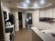 Kitchen featuring recessed lighting and view into laundry room at 3051 S Rainbow Ave, Pahrump, NV 89048