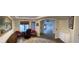 Inviting office space with wood floors, neutral paint, and an archway leading to an open area at 3051 S Rainbow Ave, Pahrump, NV 89048