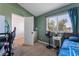 Bedroom with neutral walls, carpet, and window overlooking the yard at 3200 Mariner Bay St, Las Vegas, NV 89117